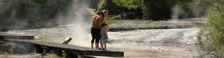 Visitors overlooking the silica terraces at Orakei Korako